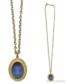 From our new Mykonos Collection. Inspired by the beautiful waters off the Greek Island of Mykonos. In Gold Plate, simple chain and a transparent Sapphire German glass intaglio pendant. Medium size pendant measures 1 by 3/4 inch. Necklace is 19 inches in length. Each necklace made to order in the USA.