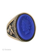 Substantial ring with acorn motif on the sides. Hand-pressed opaque Lapis blue German glass cameo. Our new Lapis is a strong royal blue, one of the fashionable new colors for this year.  7/8 inch tall. Shown in our signature Bronze. Each ring made to order in the USA.