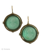 Seafoam hand-pressed German glass intaglio color in our classic earring. The large round earring measures 1 inch in diameter, yet is fairly light in weight. Very pretty opaque green for a pop of hint of pastel color. Shown in our signature red bronze metal. French hook.